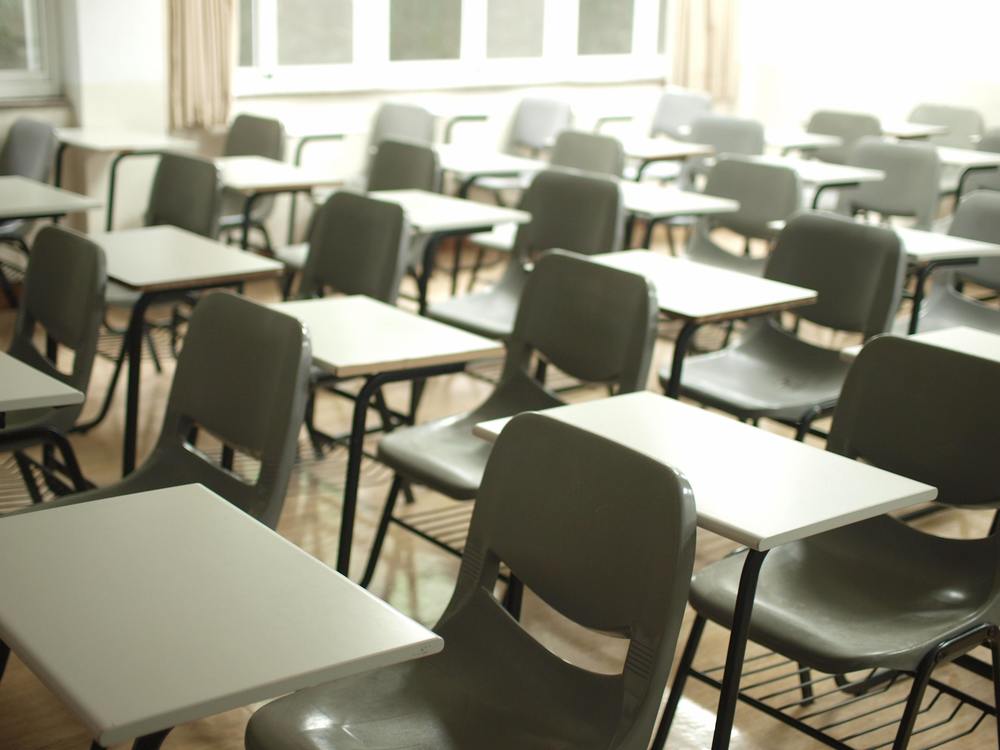 Empty classroom with chairs and desks