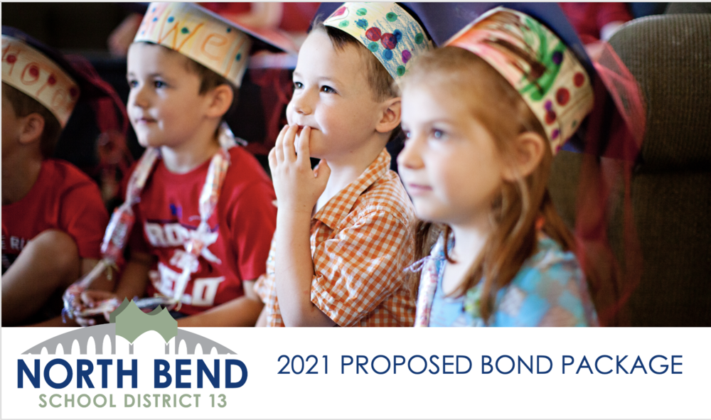Children wearing graduation hats
