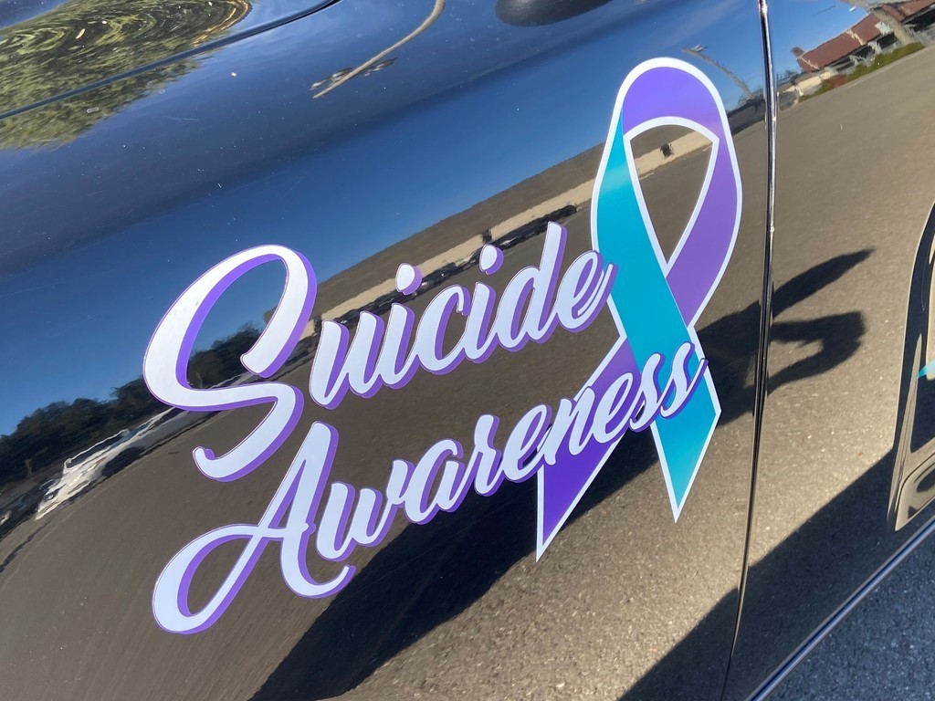"Suicide Awareness" Decal on side of the vehicle