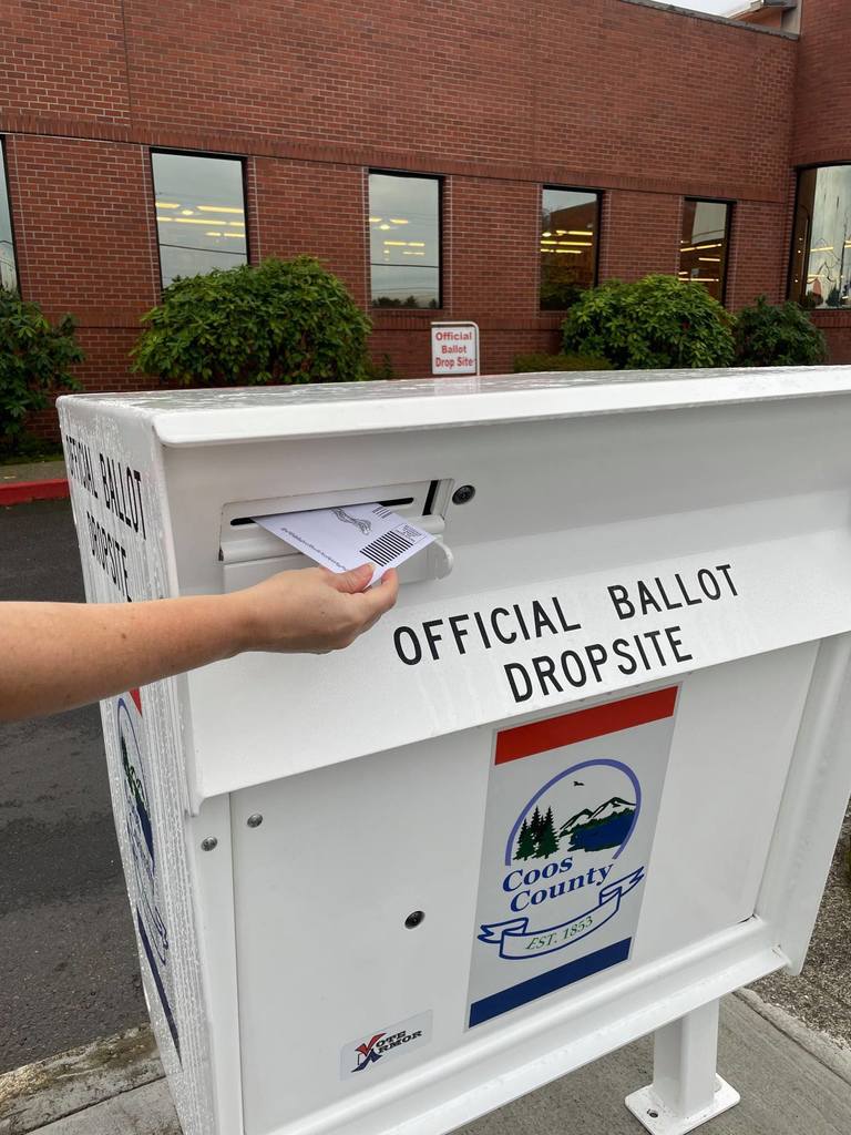 Ballot being dropped off at an official  dropsite